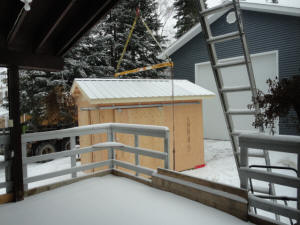 Shed being lifted
